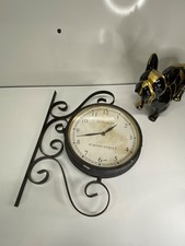 Horloge double face fer forger