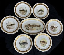 SERVICE A POISSON EN PORCELAINE  12 ASSIETTES ET UN PLAT