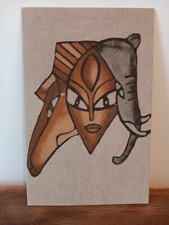 tableau africain 3 têtes en sable