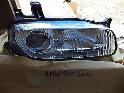 Lm7 phare droit mazda 323 - 323, f