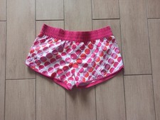 Short boardshort rose et blanc, Rip Curl, taille 18 ans S, très bon état