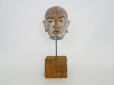 Sculpture visage en terre