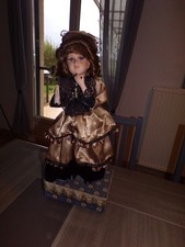 ancienne poupée porcelaine automate musicale