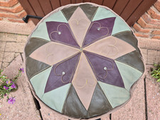 Pouf rond en simili cuir Diamètre: 48 cm Hauteur: 25 cm 