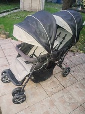 poussette double safety 1st de couleur noir et gris 