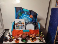 LOT SKYLANDER  SAC + JEU VIDEO GIANTS + 9 FIGURINE   + PORTAIL WII