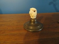 objet de curiosité presse papier en bronze et tête d'oiseau oeil de verre