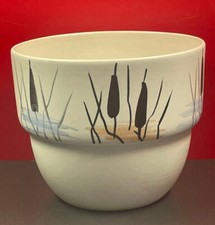 CACHE POT EN CERAMIQUE A DECOR