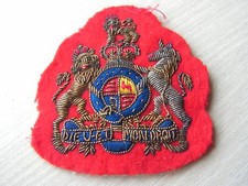 insigne broderie tissus dieu