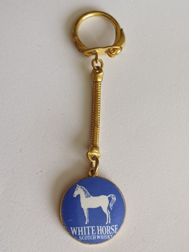 Porte clé métal doré