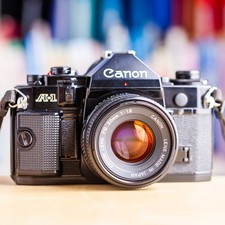 Canon A-1 + Canon 50mm f/1.8 FD + Pile Neuve A1 Black !! Super Offre !!