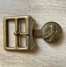 Ancienne boucle en cuivre de