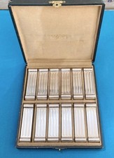 12 portes couteaux CHRISTOFLE