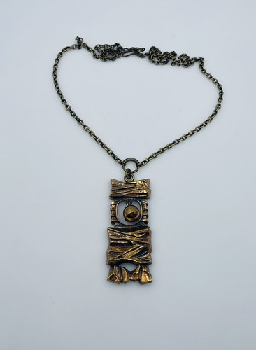 Collier moderniste bronze - en,