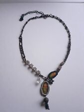 Joli collier mi-long poupée