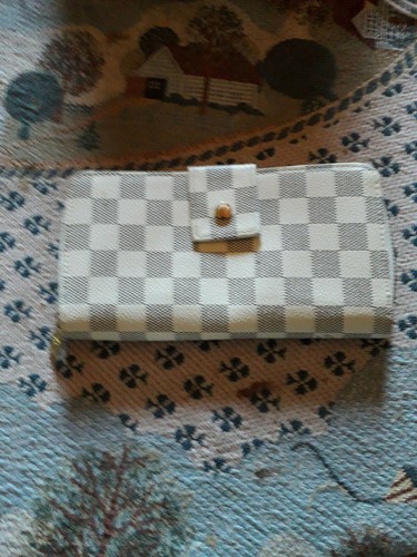 Yves saint laurent porte - laurent,