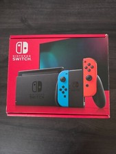 Switch kit complet + jeu Mario odyssey + 2 jeux encore sous plastique (Astérix e