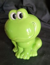 Jolie Tirelire grenouille en céramique Vert Dim H 14  ET Diam 10