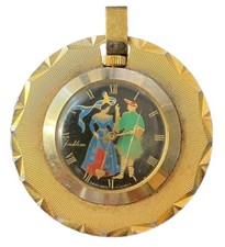 Montre pendentif JACKLINE couple Moyen-âge Médaille signée HUGUENIN Femme fleur