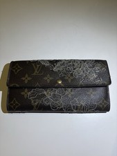 Louis Vuitton : porte monnaie