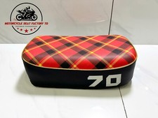 Cache selle moto Honda ATC70