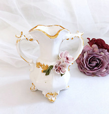 Vase soliflore, faïence forme amphore à barbotine florale signé BASSANO Italie