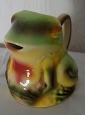 Pichet en barbotine en forme