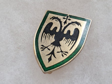 Un insigne militaire " 19° Régiment de Dragons ".