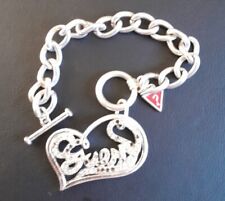 Bracelet Guess Couleur Argent. Coeur. Manque Des Strasses. 