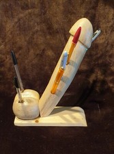 Porte stylos phallique