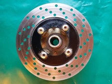 Porte disque + disque moyeu etoile de roue avant gauche TGB 550 TARGET de 2010