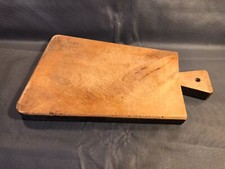 Ancienne planche à découper en bois de cuisine vintage années 1950