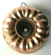 Ancien moule à gâteau en cuivre, fleur à 4 larges pétales et cheminée centrale