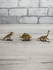 3 Fèves Dorées dinosaures en