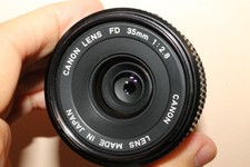 Canon 35 mm 2,8 FD + 2 bouchons