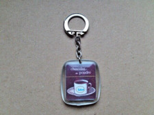 Ancien porte clé publicitaire vintage suchard chocolat poudre collection