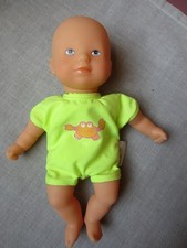 Poupon corolle 20 cm  " mini  calin bain  " avec son peignoir .