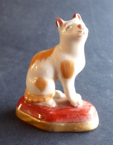 Petit figurine porcelaine - en,