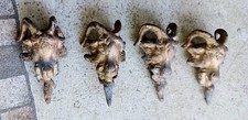 4 ornements anciens têtes de