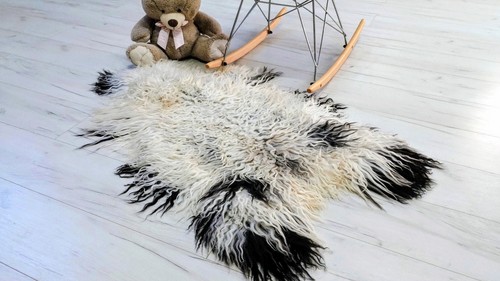 Tapis peau mouton - de,