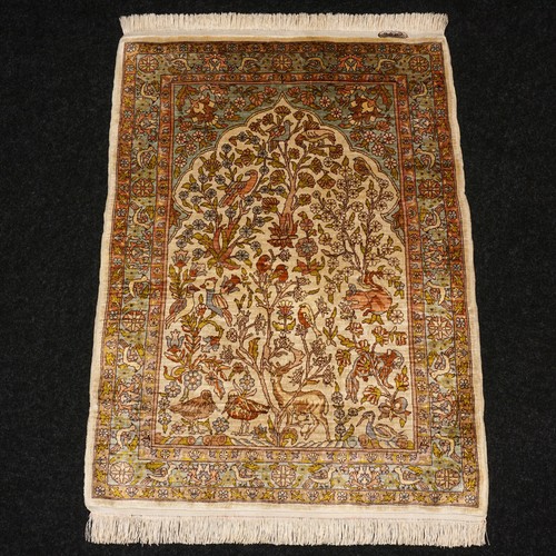 Tapis soie hereke x - en,