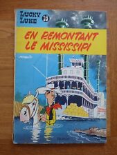 LUCKY LUKE n° 16 EN REMONTANT LE MISSISSIPI Rééd 1964 DOS JAUNE  BE