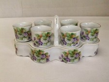 Oeufrier coquetier porcelaine service ancien décor fleurs présentoir début XXème