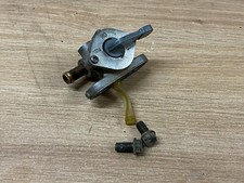 UN ROBINET ESSENCE MOTO