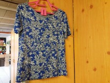 Blouse bleue et grise
