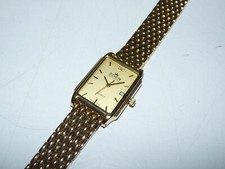 ancienne montre femme eden switzerland / tank / testé ok / pile neuve