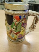 Chope de bière en faïence