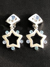 Sublime PAIRE DE BOUCLES D’OREILLES YSL de YVES SAINT LAURENT vintage ETOILES