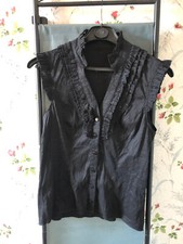 Magnifique chemisier sans