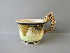 tasse en céramique signée